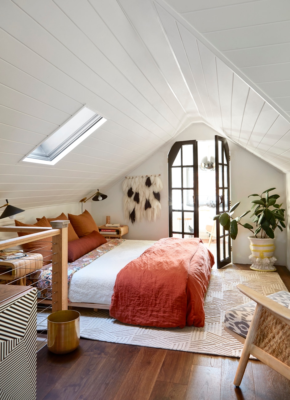attic bedroom with french doors