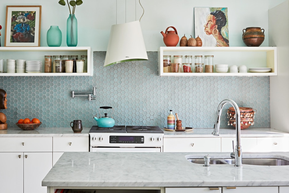 pastel kitchen with honeycomb backsplash and art decorations