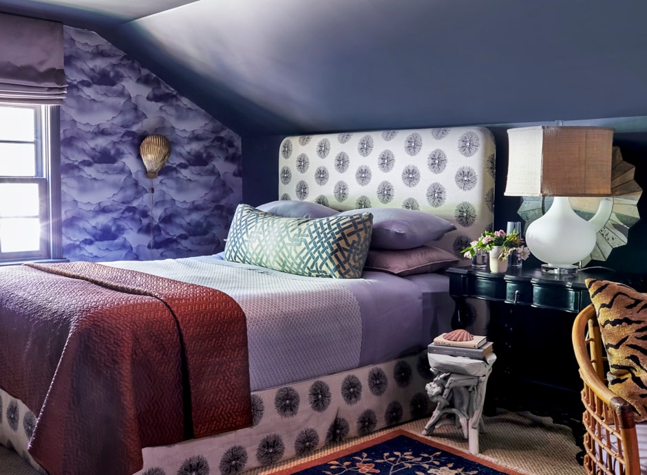 attic bedroom in cozy purple and burgundy