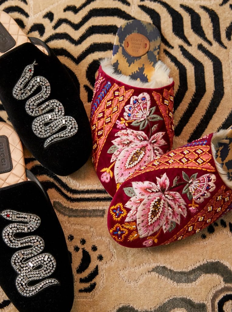 beaded colorful slippers sitting on carpet