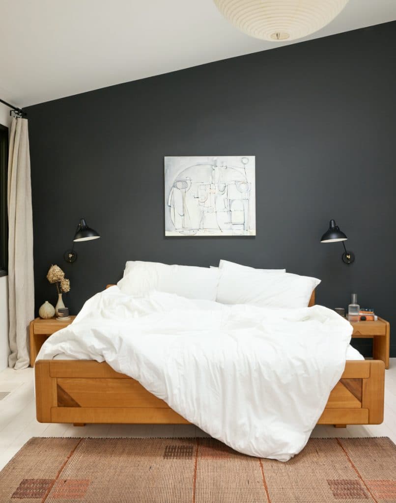 bedroom with black accent wall