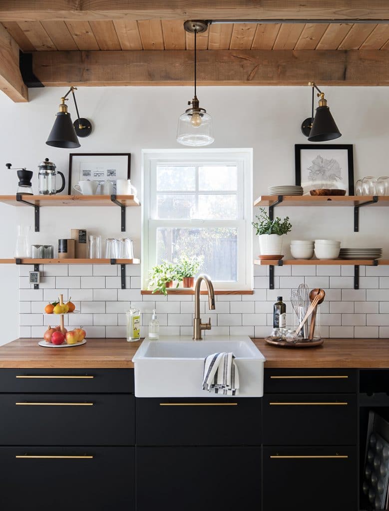 black, white, and wooden kitchen made of repurposed materials