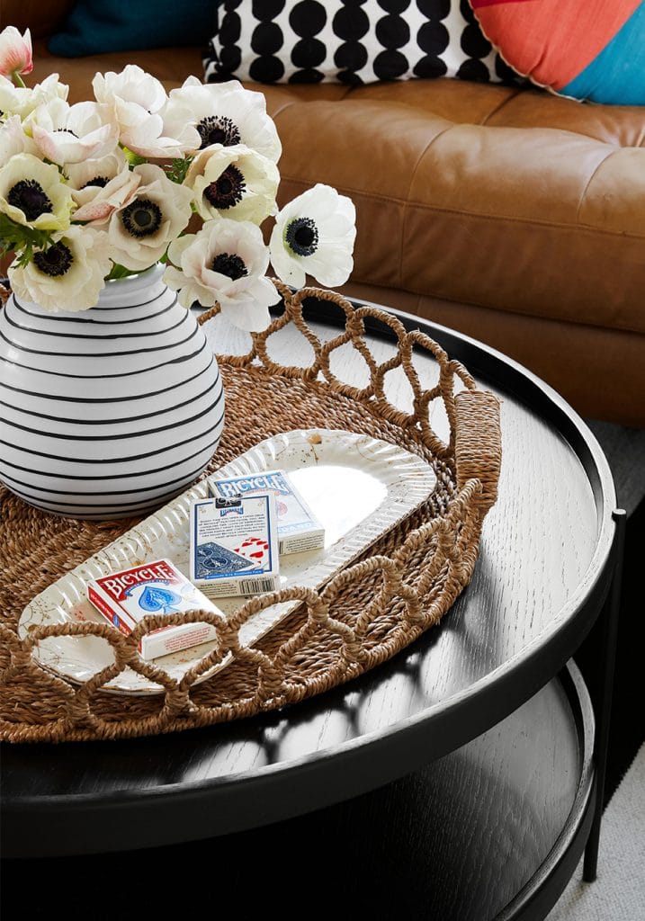 playing cards in wicker basket on coffee table