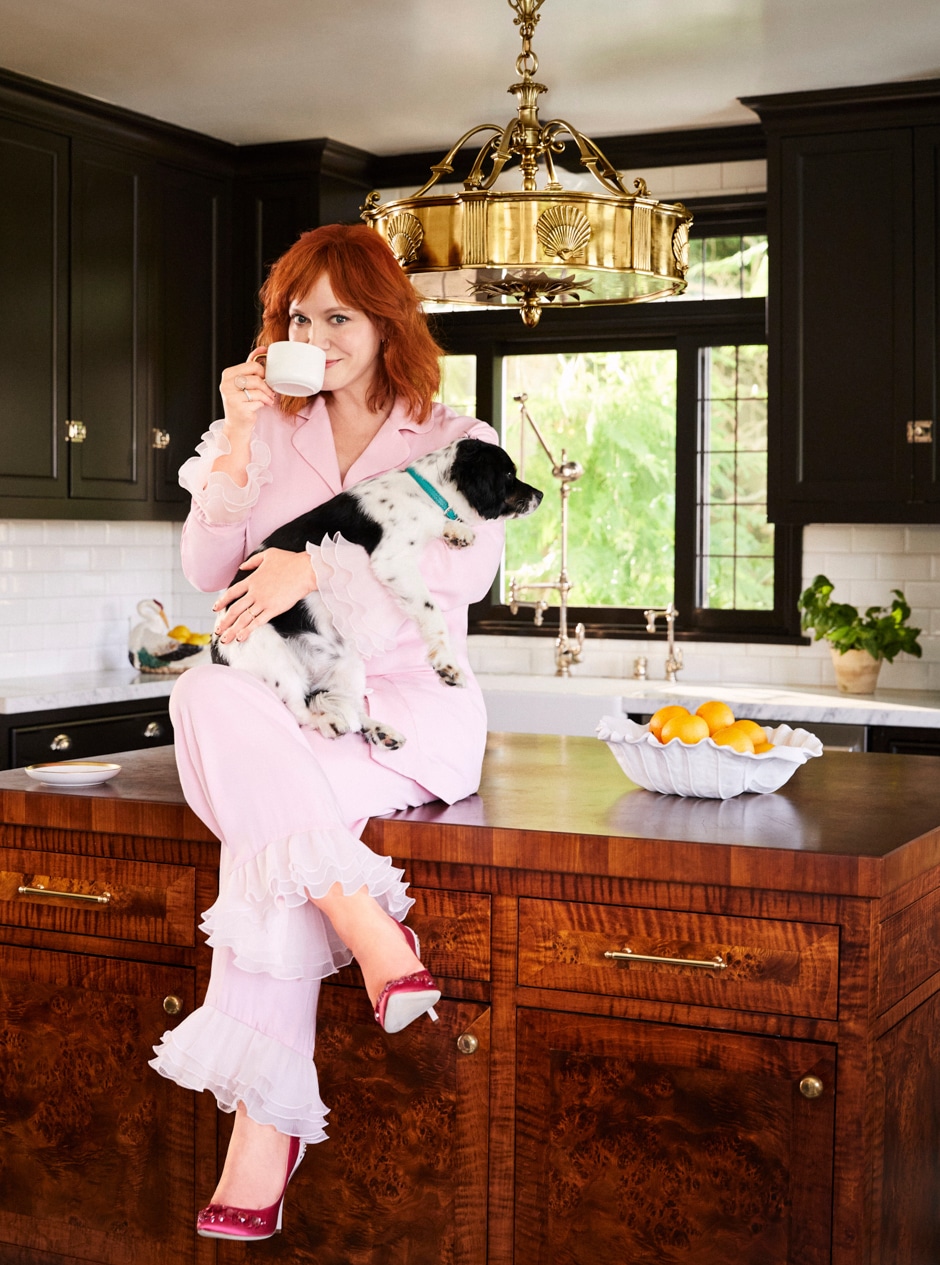 Hendricks sitting on wooden counter top in kitchen