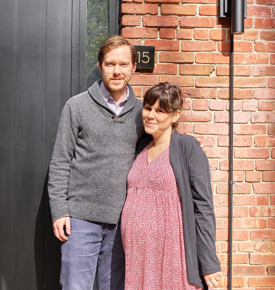 couple portrait in front of black door