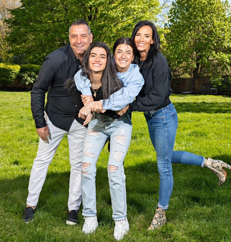 D'Amelio family portrait on lawn