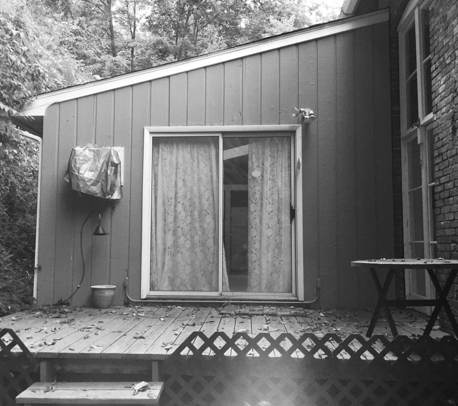 black and white deck photo before renovation
