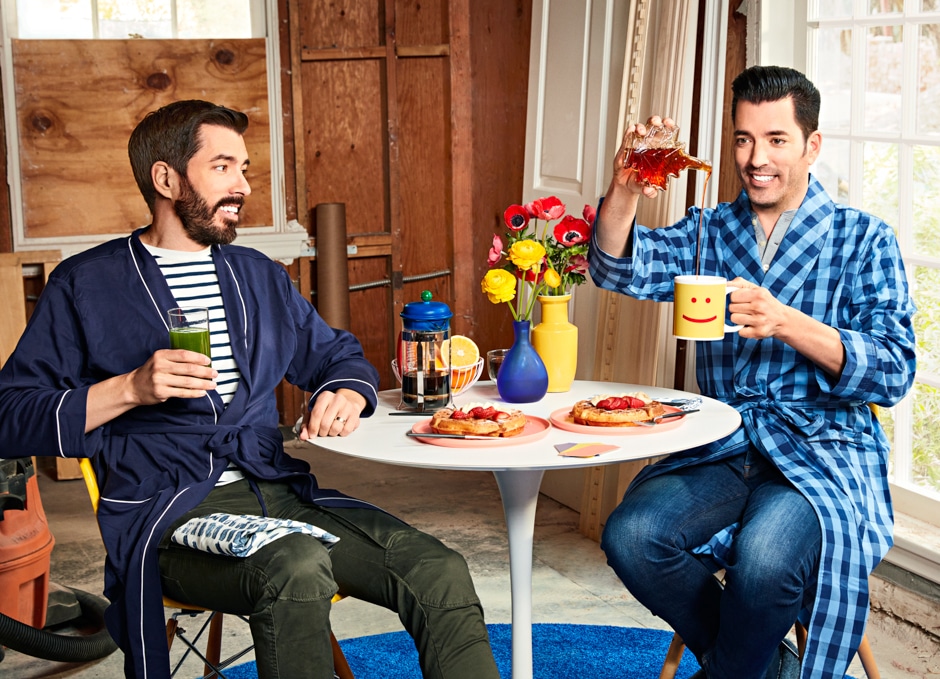 Drew and Jonathan sitting at colorful breakfast table at demo site