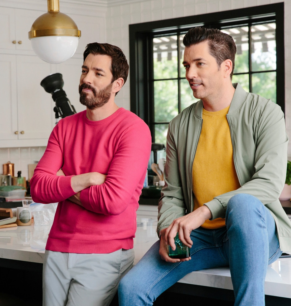 Drew and Jonathan sitting on kitchen island