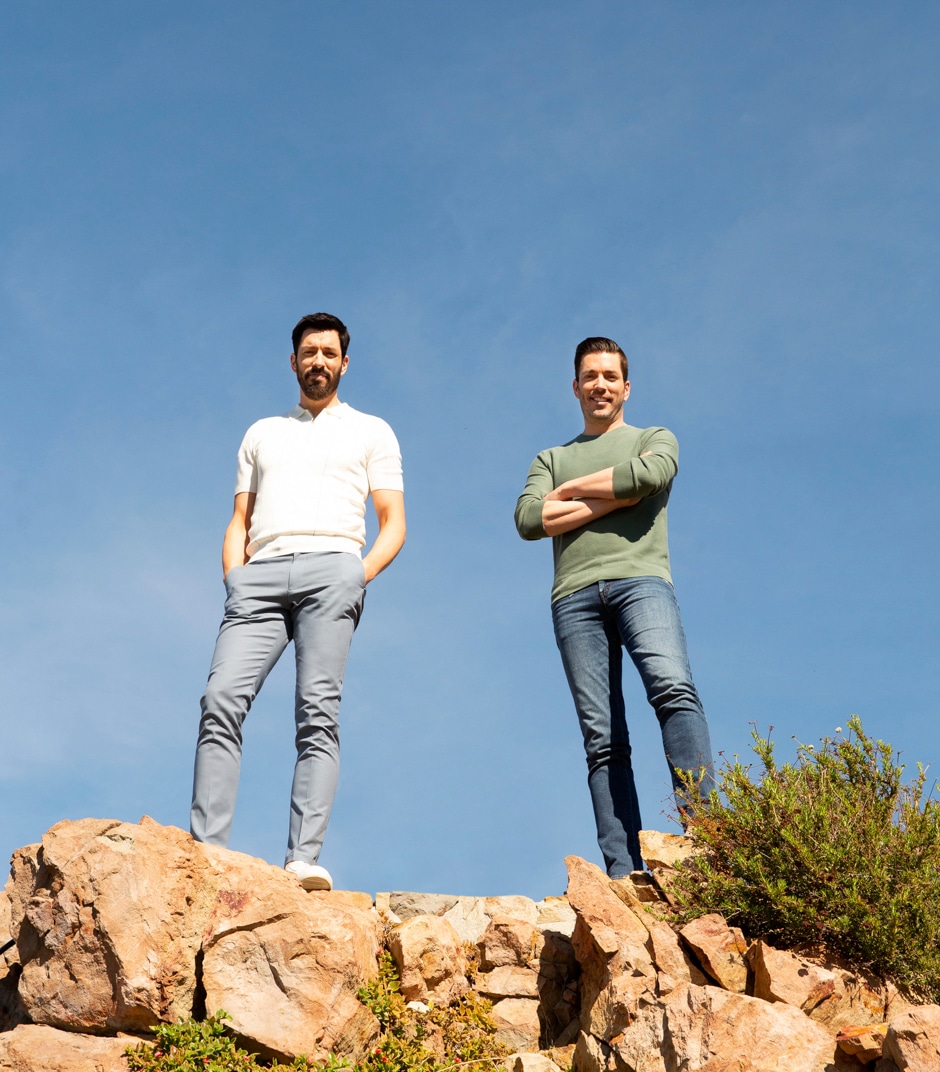 drew and jonathan standing on rocks outdoors