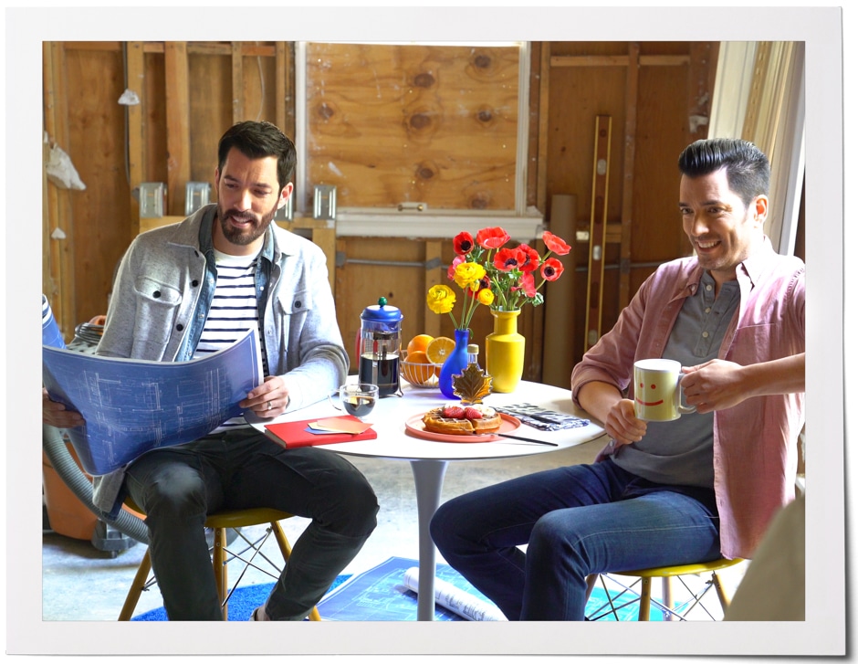 polaroid of drew and Jonathan sitting at breakfast table on demo site