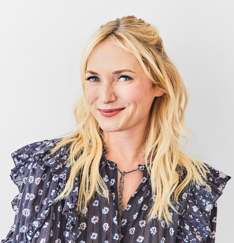 Emily Henderson portrait in floral top