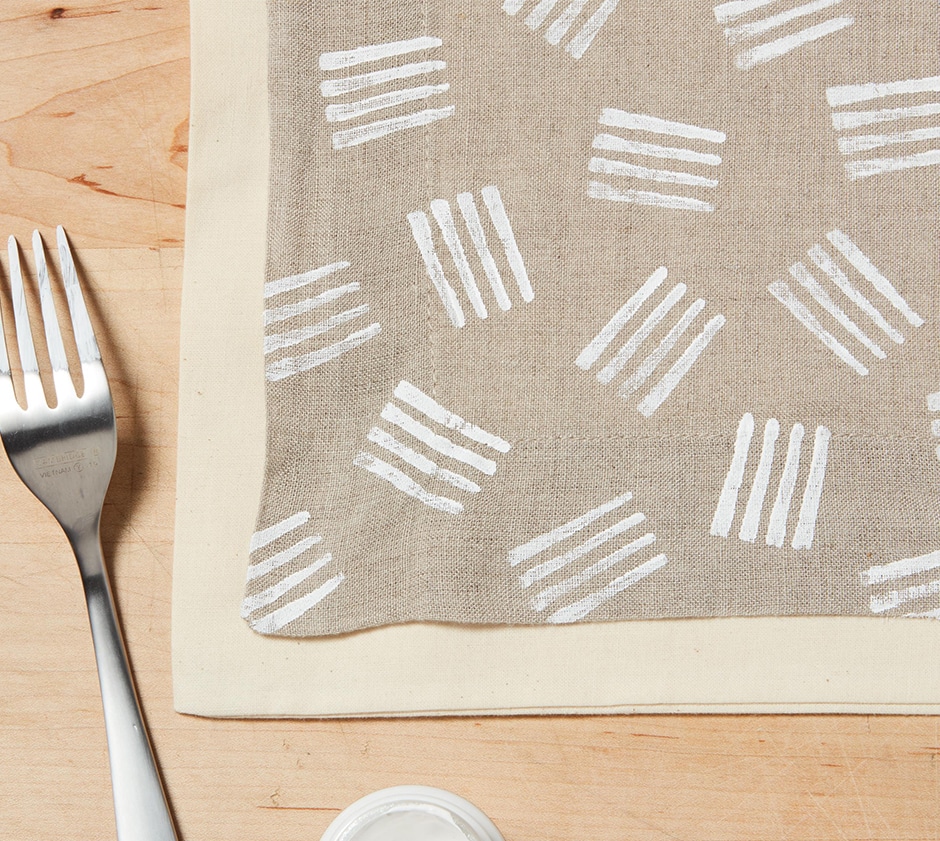 napkin with painted fork patterns