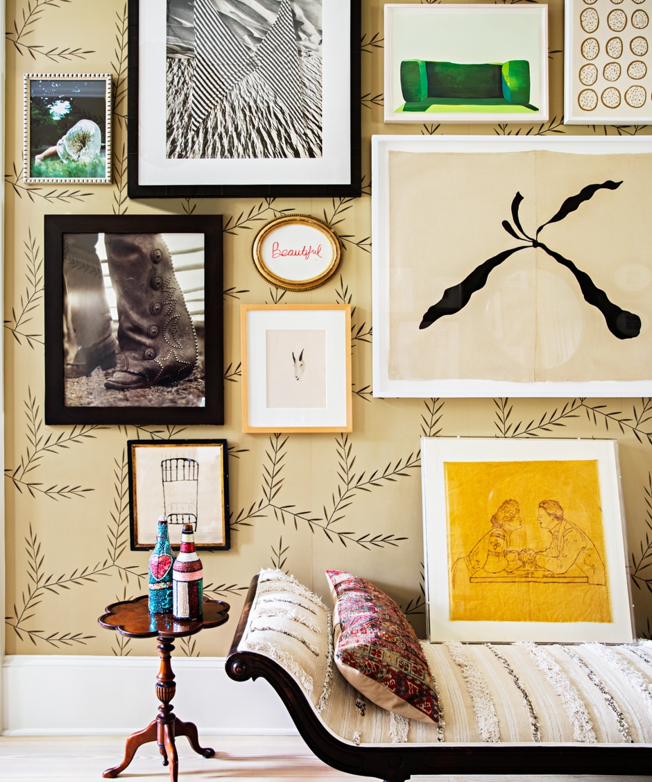 eclectic gallery wall with couch below