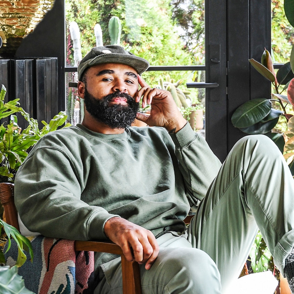 hilton carter portrait surrounded by plants