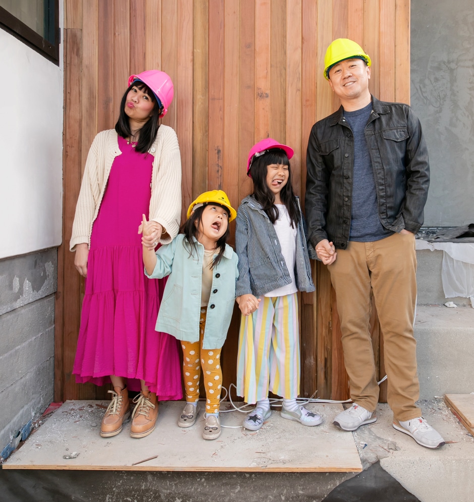 Joy and Bob Cho family portrait in house under construction