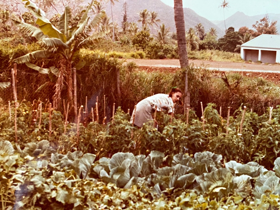vintage photo of woman working in garden