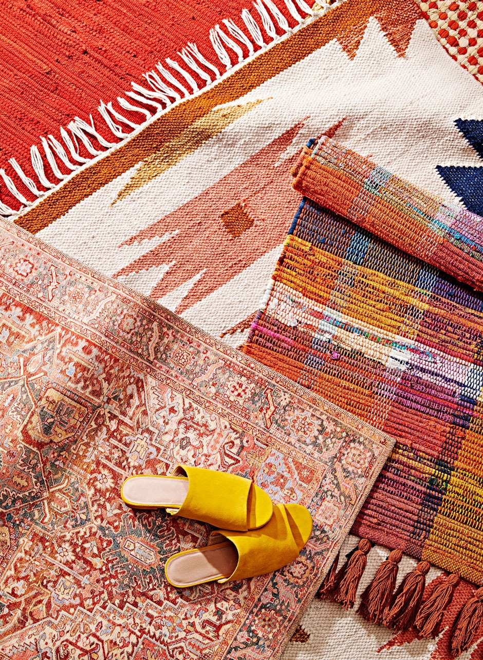 layered bohemian patterned rugs