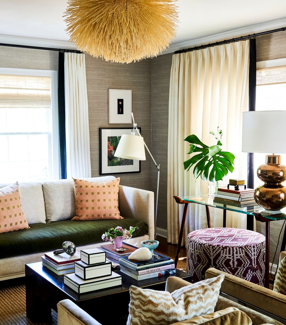 living room with couch and velvet chairs