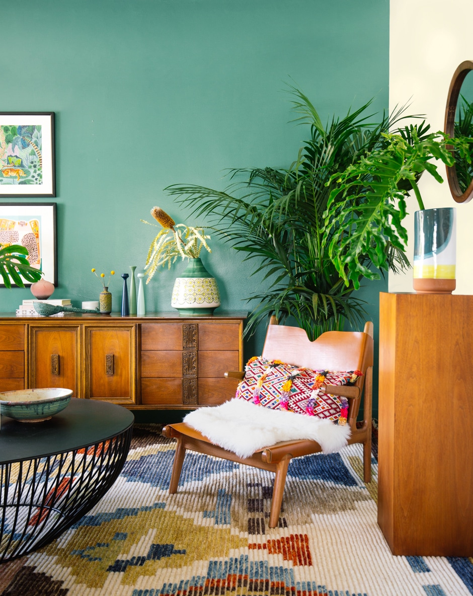 midcentury modern living room with green walls