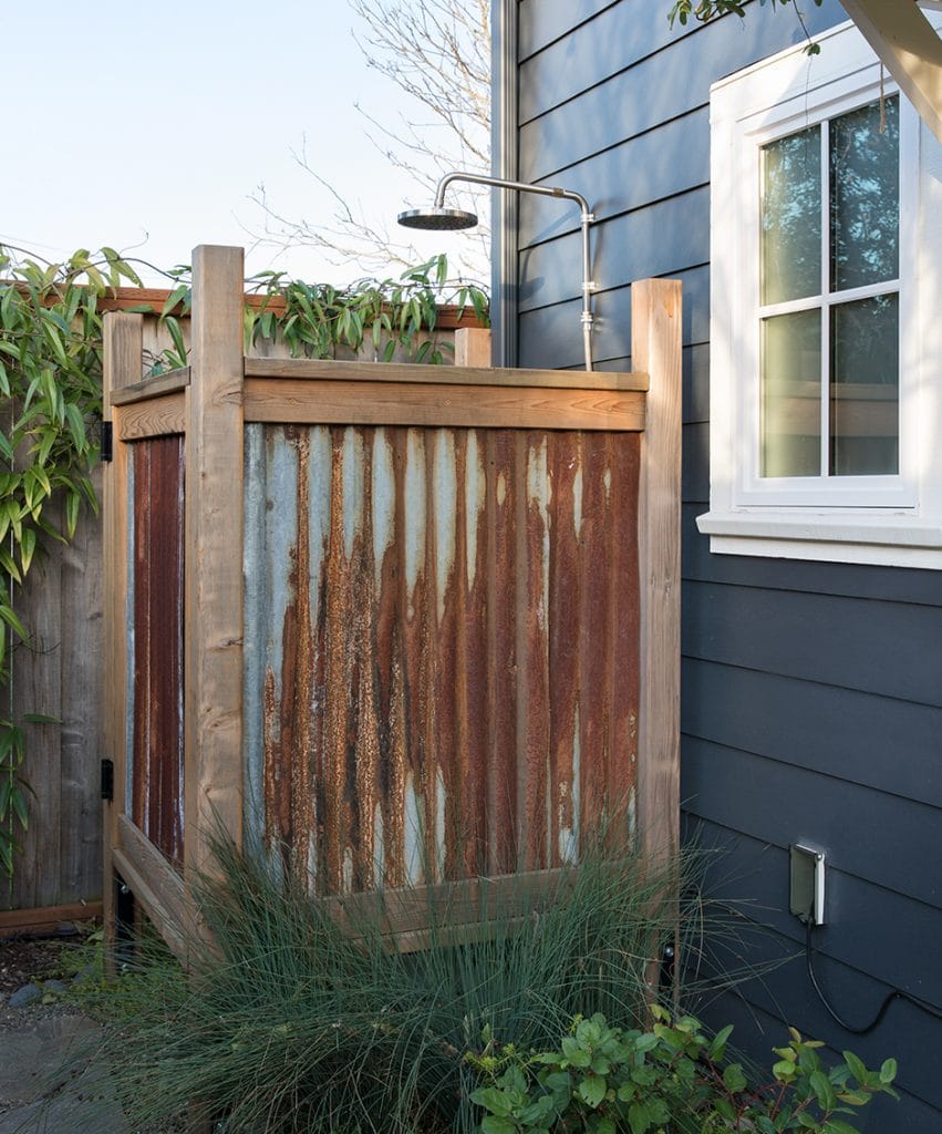 outdoor shower made of repurposed metal garage materials