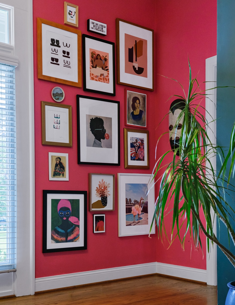 pink gallery wall with framed art