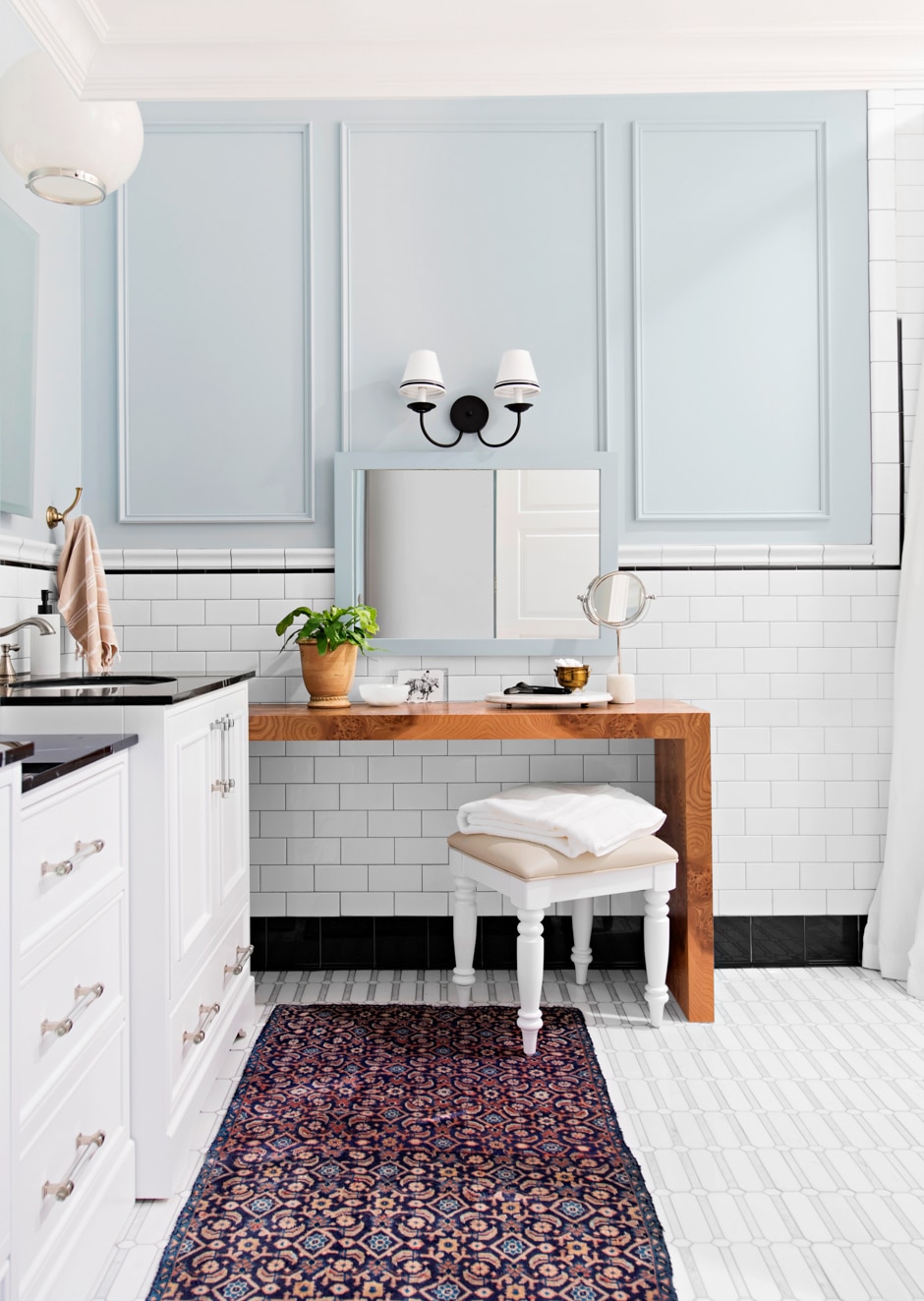 renovated white and pastel blue bathroom