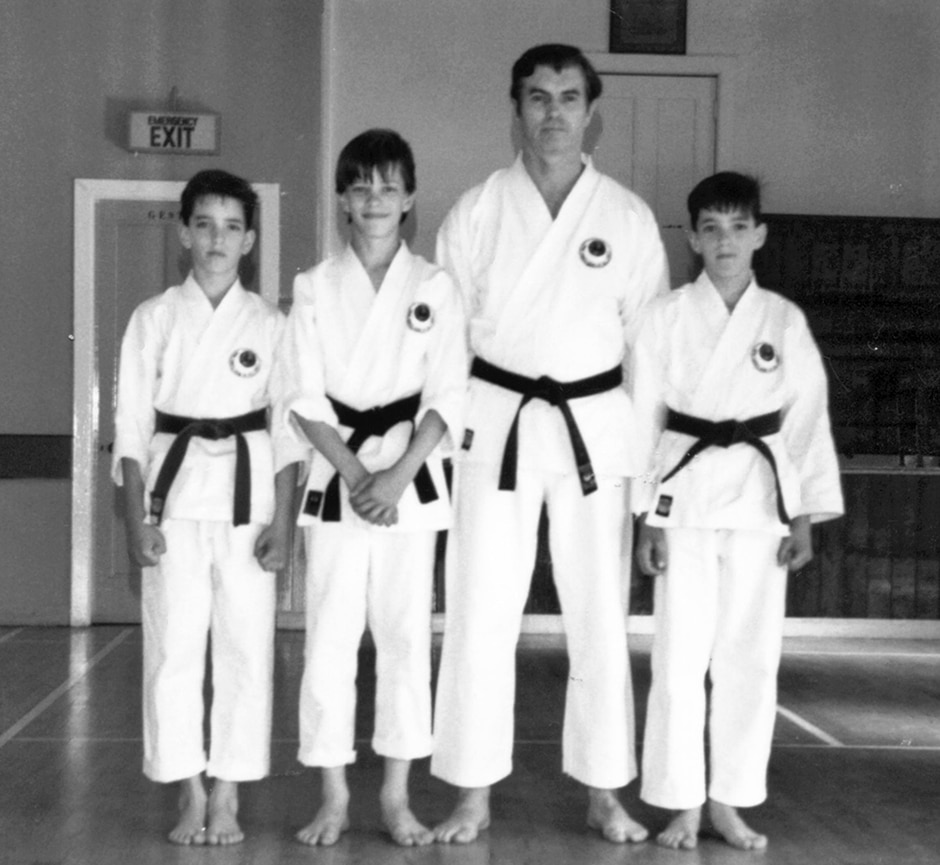 scott brothers with father at karate demonstration