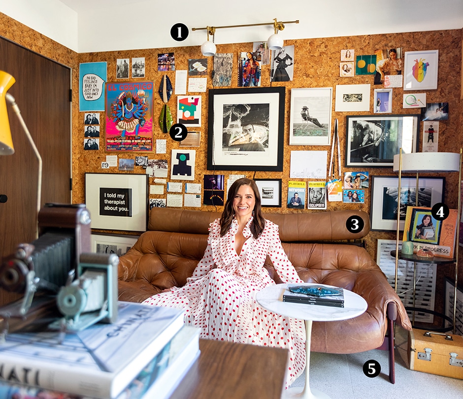 Sophia Bush sitting on leather couch in home office with number labels