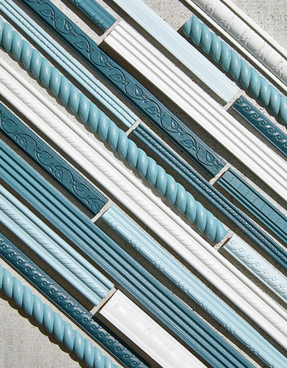 teal and white pieces of decorative trim