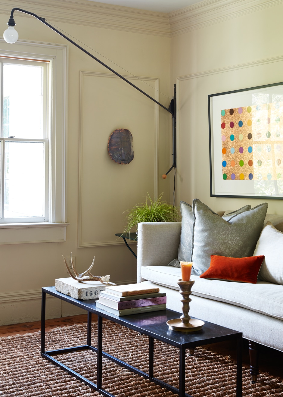 living room with traditional decor and modern art piece