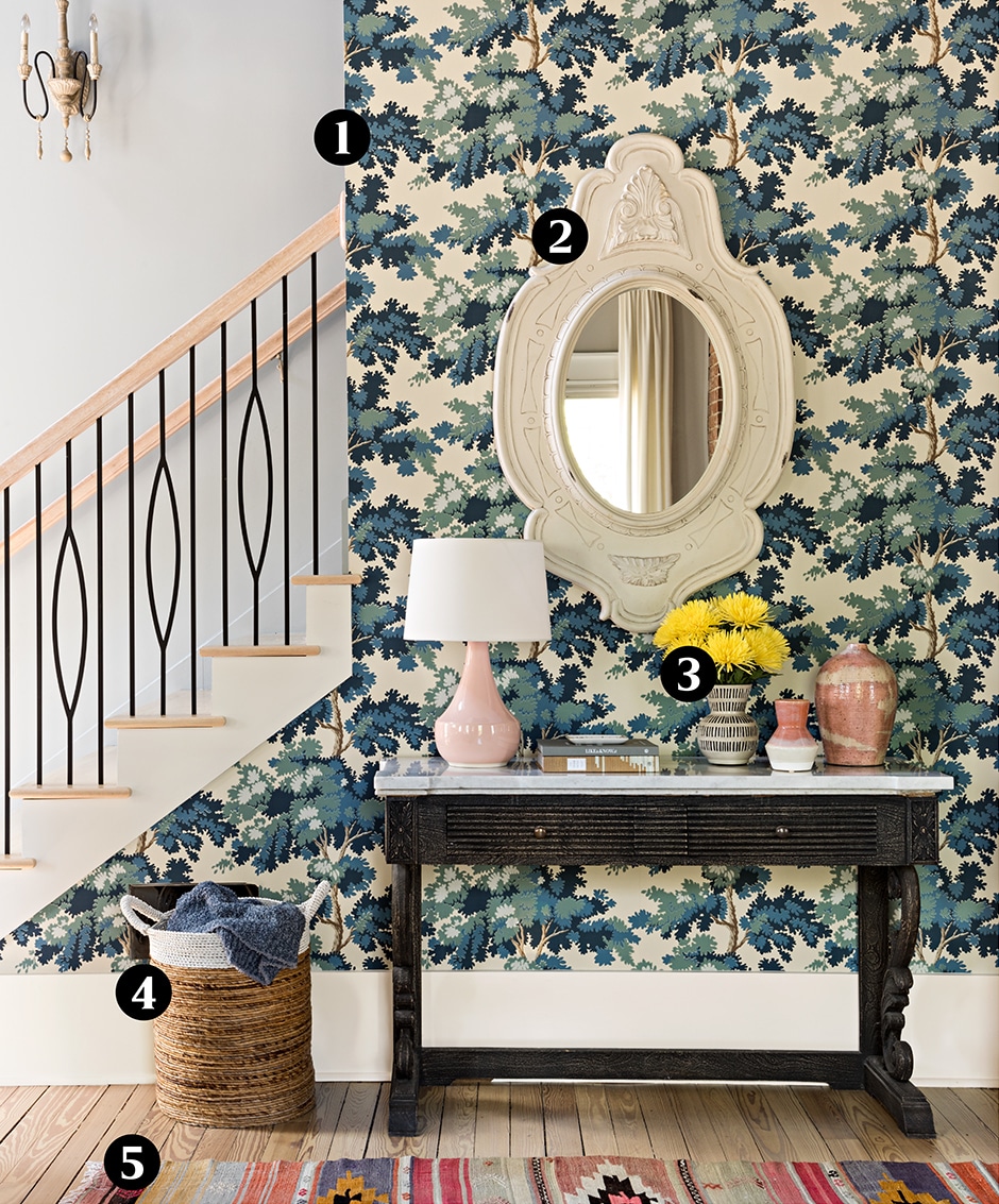 wallpapered entryway with mirror number labels