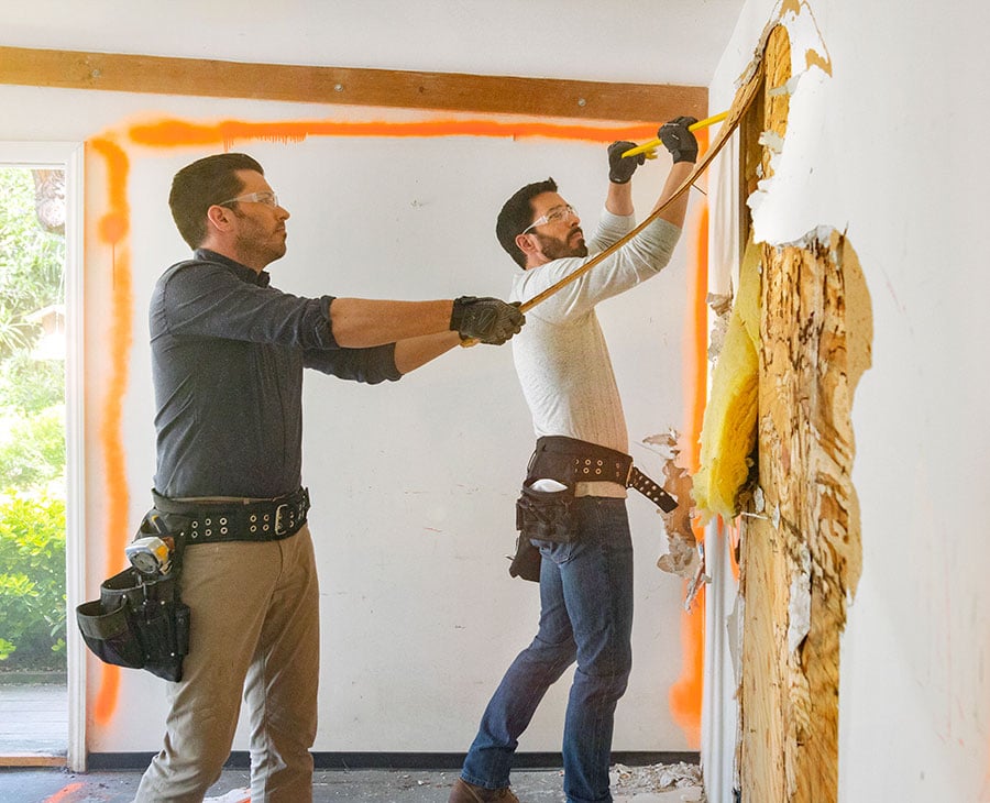 Drew and Jonathan removing a wall