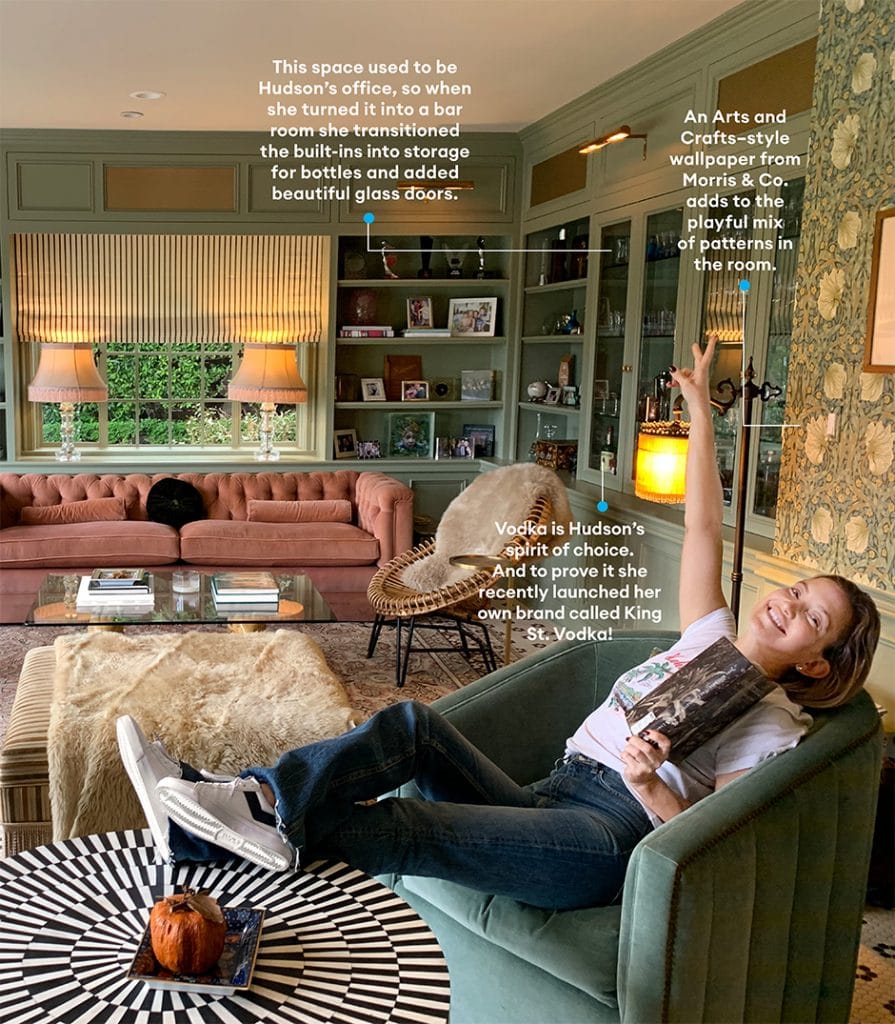 kate hudson sitting in living room