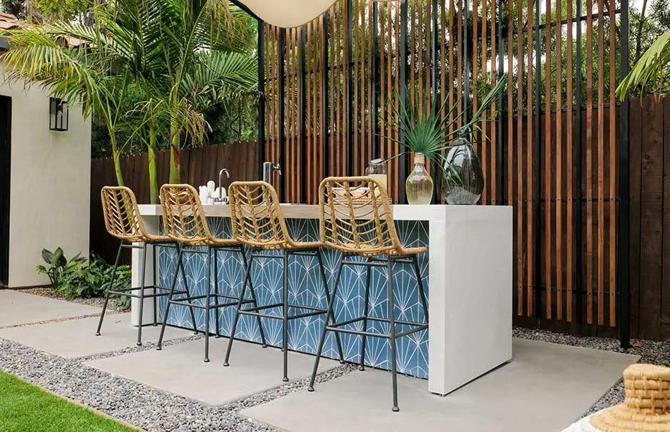 outdoor bar with stools and modern accents
