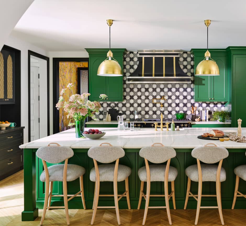 green cabinet kitchen with large island