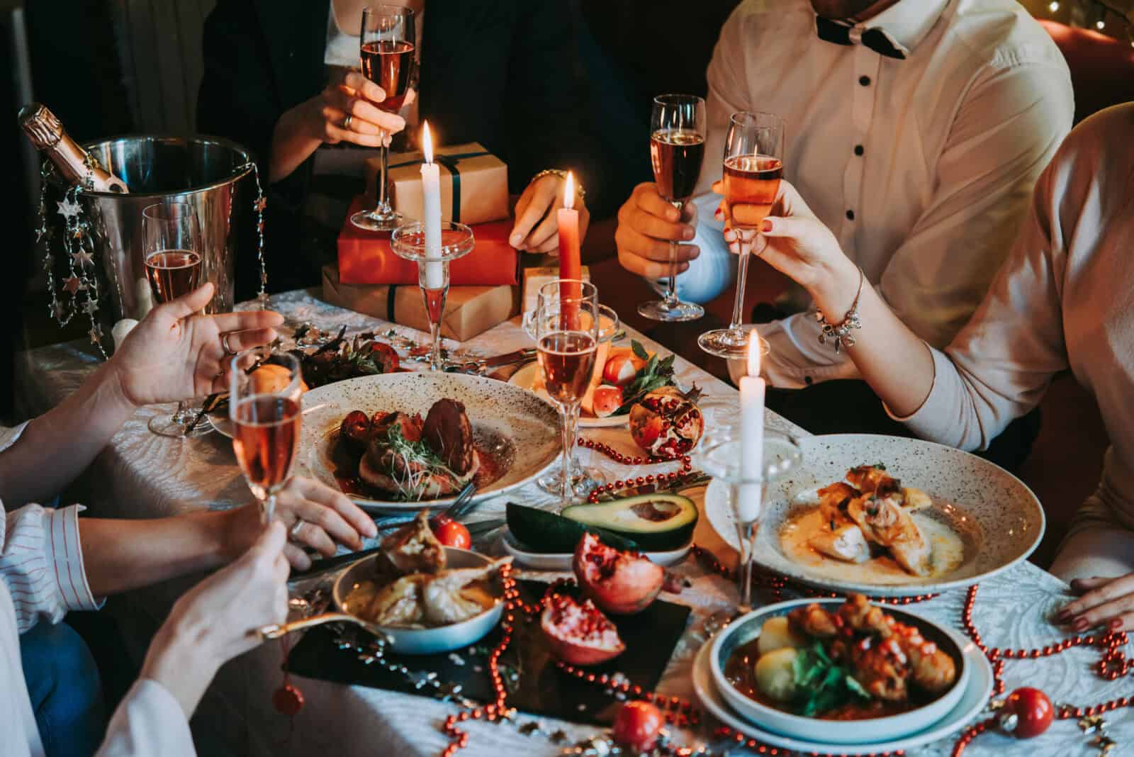 Holiday Gathering Friends Around Dinner Table