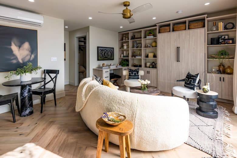 Curved cream couch in living room