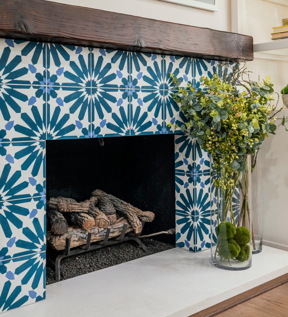 blue and white custom tile fireplace