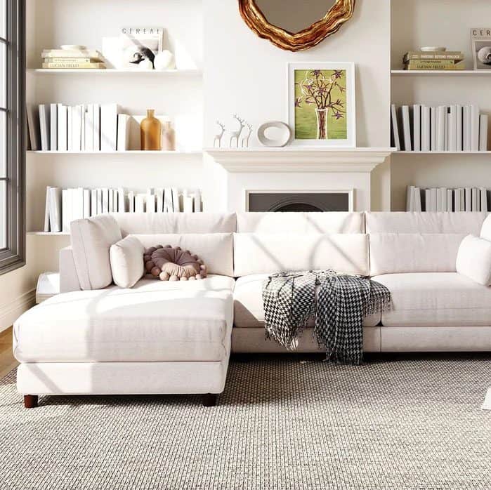 https://www.drewandjonathan.com/wp-content/uploads/2023/08/traditional-home-decor-ideas-sofa.jpg