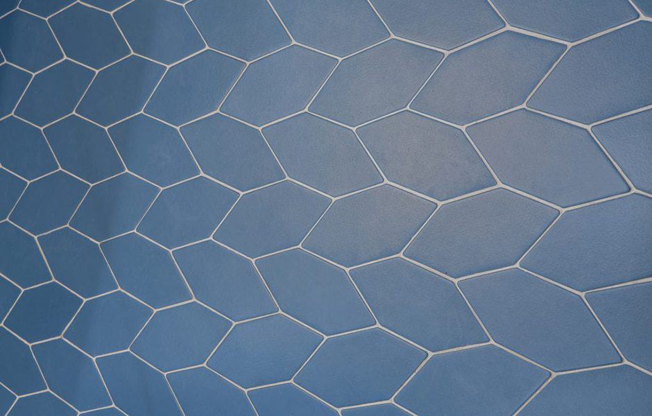 Blue hexagonal tile pattern with white grout lines