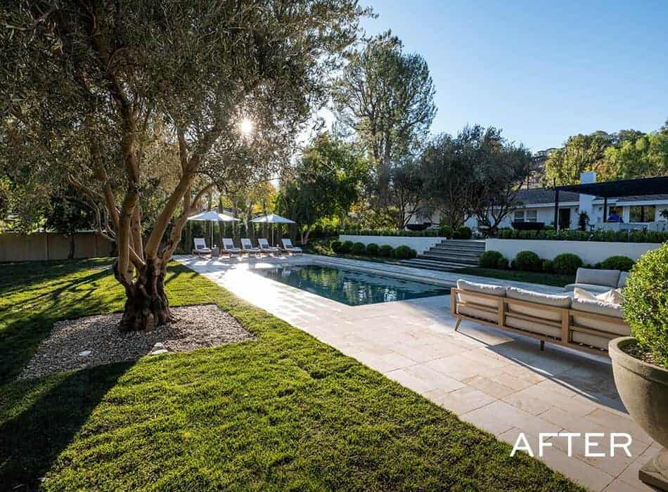 An after image of a lush outdoor pool area with lounge seating, manicured lawn, and mature trees creating a serene retreat