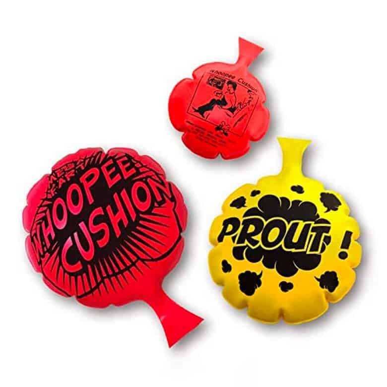 Red and yellow whoopee cushions with playful text designs