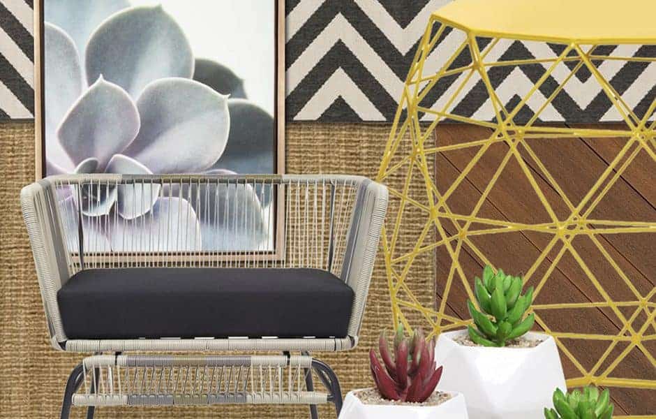Modern boho decor with geometric patterns, succulents, and a bold yellow table
