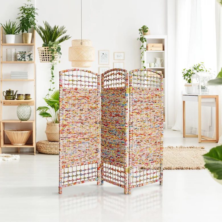 Patterned room divider in open concept space