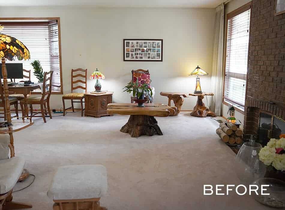 Rustic living room with wooden furniture Tiffany lamps and brick fireplace