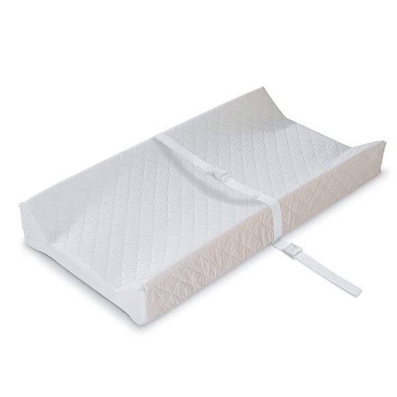 Contoured changing pad for babies