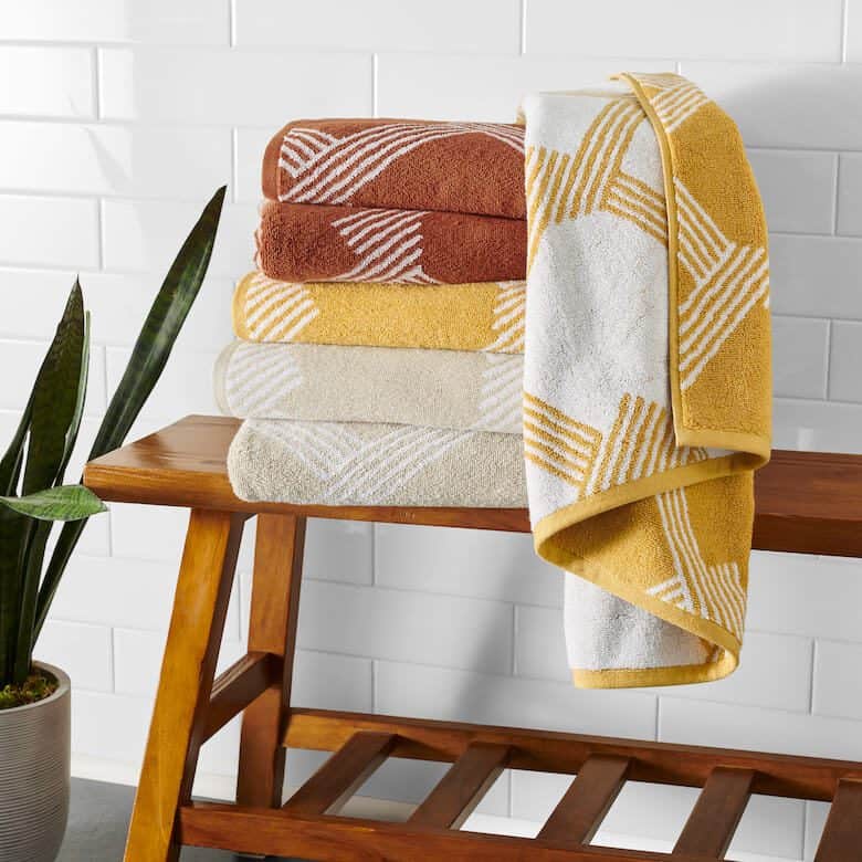 https://www.drewandjonathan.com/wp-content/uploads/2023/10/Colorful-Bath-Towels.jpg