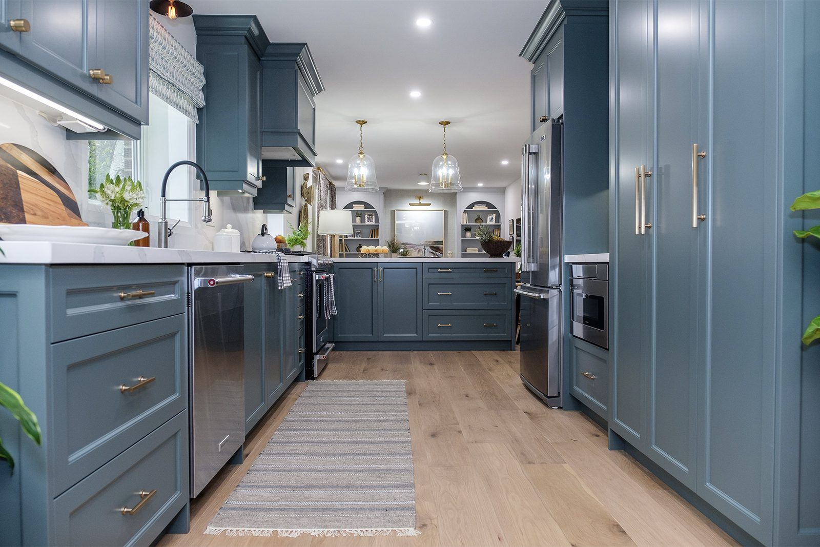 kitchen reveal, blue colors and light wood floor