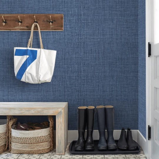 blue textured wallpaper in mud room